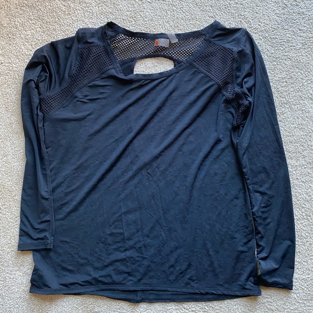 Black Zella top With Mesh and Back Interest